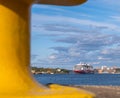 Look through anchor onto one big ship coming from Finland to Stockholm