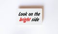 Look on the bright side advice or reminder - sticky note on a clipboard with a cup of tea Royalty Free Stock Photo