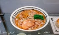 A look through cabinet mirror of Japanese ramen food model