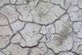 Look down on crack dried mud surface of the ground. Royalty Free Stock Photo