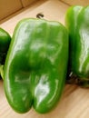 Green peppers in the tray.