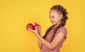 look at this. full of vitamin. smiling kid hold red apple. vegetarian diet. autumn harvest.