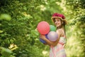 Look at it. Hairstyle of nature. mothers day. happy womens day. Portrait of small kid with party balloons. love and