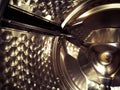 Look Inside the washing machine metal drum Royalty Free Stock Photo