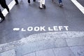 LOOK LEFT sign on the street