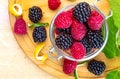 They look like artificial treats! But they are delicious and beautiful blackberries and fresh raspberries. Royalty Free Stock Photo