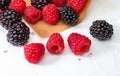 They look like artificial treats! But they are delicious and beautiful blackberries and fresh raspberries. Royalty Free Stock Photo