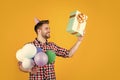 look over there. happy birthday to you. male holiday celebration. bearded guy with party balloons and gift box. unshaven Royalty Free Stock Photo
