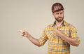 look over there. mature builder in shirt. unshaven man on construction site. handsome building worker in hard hat. labor Royalty Free Stock Photo