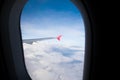 Look through the plane window and white cloud and blue sky Royalty Free Stock Photo