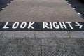 `Look right` road marking on a pedestrian crossing in London, UK Royalty Free Stock Photo