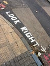 Look right, written on the street in London UK Royalty Free Stock Photo