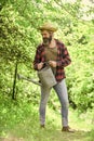 Look after them and store them carefully. Tools for gardening. Gardener agricultural worker with garden tools. Caucasian Royalty Free Stock Photo