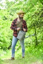 Look after them and store them carefully. Tools for gardening. Gardener agricultural worker with garden tools. Caucasian Royalty Free Stock Photo