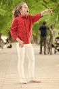 Look there. Small girl relaxing in park. Little child enjoy walk park. Weekend time. Girl carefree child. Summer Royalty Free Stock Photo