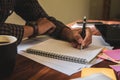 Look time, Asian young business man of student holding a pen writing letter on paper at home Royalty Free Stock Photo