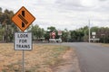 Look For Trains and other warning signs approaching a railway crossing Royalty Free Stock Photo