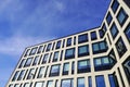 Look up to white building facade towards blue sky. Kopli, Tallinn, Estonia. February 2024 Royalty Free Stock Photo