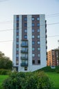 Look up to the white new building in Lasnamae part of the city with green grass. Tallinn, Estonia. September 2023 Royalty Free Stock Photo