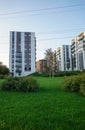 Look up to the white new buildings in Lasnamae part of the city with green grass. Tallinn, Estonia. September 2023 Royalty Free Stock Photo