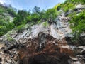 Look up view of limestone hill in Tasik Cermin, Ipoh. Royalty Free Stock Photo