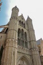 A Look At The Walls, Entrance And Roof Of An Ancient Brick Christian Church In Bruges, Belgium