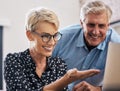 Look at what Ive done. a mature couple using a laptop at home. Royalty Free Stock Photo