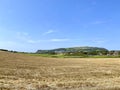 Looking across hay fields towards Port Erin, Isle of Man Royalty Free Stock Photo