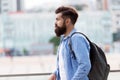 Looking for adventures. Tourist handsome thoughtful hipster backpack. Man with beard and rucksack explore city Royalty Free Stock Photo