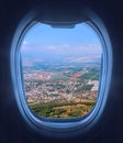 Looking through the airliner window out. Flying over the Israel North