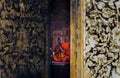 Looking through the the ajar door buddhist monks sitting praying and pay respect Buddha image in main vihan