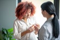 Woman looking at antidepressants while speaking with psychoanalyst