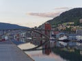 Looking through the arched road bridge and into Bergen City Centre at Dawn Royalty Free Stock Photo