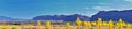 Looking back towards Moab Panorama views of desert mountain ranges along Highway 191 in Utah in fall. Scenic nature near Canyonlan