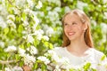 Looking beautiful teenager girl with white flowers Royalty Free Stock Photo