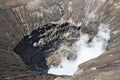 Looking into big crater of active Bromo Volcano in Indonesia