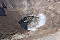 Looking into big crater of active Bromo Volcano in Indonesia