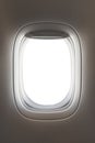 Looking through a big jet passenger plane window Royalty Free Stock Photo