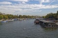 Looking from a Bridge across the Seine and the River Traffic, to the Debilly Bridge Royalty Free Stock Photo