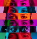 Horizontal collage of cropped male and female eyes placed on narrow stripes in neon lights. Royalty Free Stock Photo