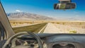 Car windshield with view of desert road, Death Valley, USA Royalty Free Stock Photo