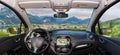 Car windshield view of Riva del Garda, Lake Garda, Italy