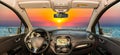 Car windshield view of scenic sunset on the mediterranean sea Royalty Free Stock Photo