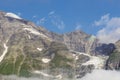 Looking through the clouds at the slopes of the Hoher Tenn