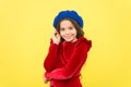 Looking co cute. smiling stylish teen girl in french beret. parisian kid wear red dress. elegant look of child. kid