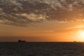 Looking at dark silhouette of Bulker boat from Sunshine Skyway Bridge - 1 Royalty Free Stock Photo