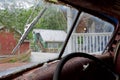 Looking through the dirty windscreen of a deralict vehicle in Telegraph Cove, Vancouver Island