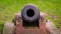 Looking down the barrel of a cannon on the Moat Brae at Kirkcudbright Royalty Free Stock Photo