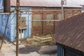 Looking down between buildings of an abandoned brick factory complex