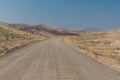 Looking Down Dirt Road to Painted Hills Royalty Free Stock Photo